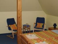 Postel nebo postele na pokoji v ubytování Hotel U Zvonu