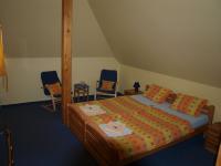 Postel nebo postele na pokoji v ubytování Hotel U Zvonu