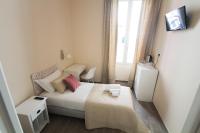 Posteľ alebo postele v izbe v ubytovaní Emily Rooms