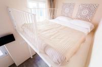 Posteľ alebo postele v izbe v ubytovaní Emily Rooms