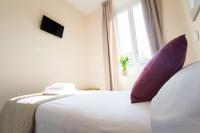 Posteľ alebo postele v izbe v ubytovaní Emily Rooms