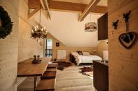 Posteľ alebo postele v izbe v ubytovaní Steirer-Apartment Semmering