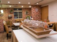 a table with a basket on top of it at E-House Hotel in Taipei