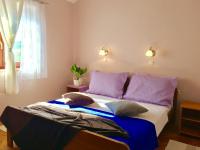 Postel nebo postele na pokoji v ubytování Lavender House
