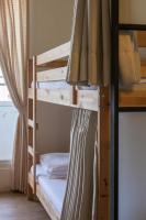 a couple of bunk beds in a room at Sleeping Boot Hostel in Hualien City