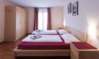 Una cama o camas en una habitaci&oacute;n de Haus Angelika