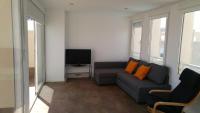 A television and/or entertainment centre at Cabo Mar Duplex