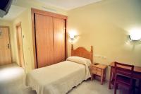 Posteľ alebo postele v izbe v ubytovaní Hostal Restaurante Hermanos Zamora