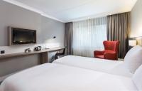 Ramada by Wyndham Amsterdam Airport Schipholにあるベッド