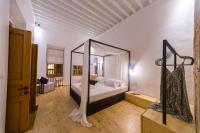 A bed or beds in a room at Villa Myrto