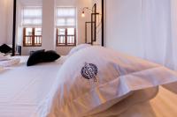 A bed or beds in a room at Villa Myrto