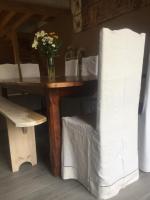 a table with a bunch of white towels on it at Le Chat Blanc in Versols-et-Lapeyre