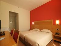 Postel nebo postele na pokoji v ubytování Diana Hotel