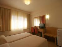 Postel nebo postele na pokoji v ubytování Diana Hotel