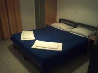 Cama ou camas em um quarto em Liberatos Village