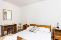 Posteľ alebo postele v izbe v ubytovaní Guest House Rajic