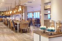 Restaurace v ubytování Beach Apartments Heiligenhafen