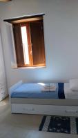 Posteľ alebo postele v izbe v ubytovaní casa Marino