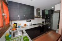 A kitchen or kitchenette at Casa Forn