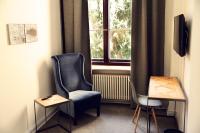 TV a/nebo společenská místnost v ubytování Romantik Hotel Schloss Reichenow