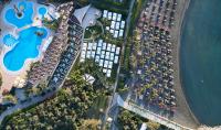 an aerial view of a resort with a pool and parking lot at Four Seasons Hotel in Limassol