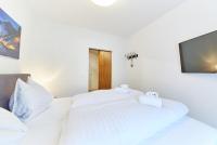Łóżko lub łóżka w pokoju w obiekcie Appartement Diamond