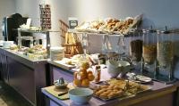 a buffet with a lot of food on a table at Best Western Hotel de la Breche in Niort