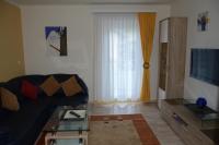A television and/or entertainment centre at Haus Thon