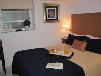 A bed or beds in a room at APARTAMENTO EN CENTRO HISTÓRICO con PARKING GRATIS
