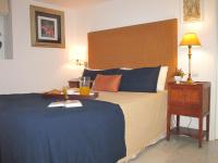 A bed or beds in a room at APARTAMENTO EN CENTRO HISTÓRICO con PARKING GRATIS