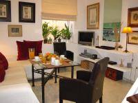 A television and/or entertainment centre at APARTAMENTO EN CENTRO HISTÓRICO con PARKING GRATIS
