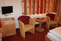 Telewizja i/lub zestaw kina domowego w obiekcie Hotel Garni Waldhof - Wohlfühlen am Lech