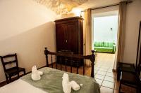 Postel nebo postele na pokoji v ubytování Casa Cueva El Molino