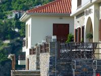 A balcony or terrace at Pilion Terra Hotel