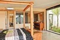 A bed or beds in a room at Can Do It