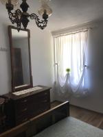 A bed or beds in a room at Casa Paolina - CIPAT 57814