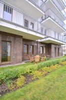 Vonkajšia záhrada v ubytovaní Apartamenty na Wyspie - Aquamarina - Budynek A - B - C