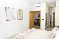Posteľ alebo postele v izbe v ubytovaní Apartamento Malagueta Gutenberg