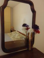 Łóżko lub łóżka w pokoju w obiekcie Accogliente e ospitale B&B