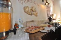 a table with a box of food on a counter at Hotel Perlach Allee by Blattl in Munich