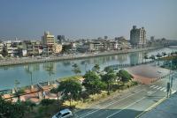 a view of a city with a river and buildings at Wei-Yat Grand Hotel in Anping