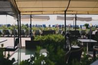 Reštaurácia alebo iné gastronomické zariadenie v ubytovaní Hotel La Bussola