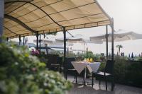 Reštaurácia alebo iné gastronomické zariadenie v ubytovaní Hotel La Bussola