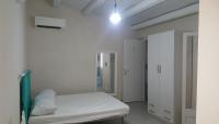 A bed or beds in a room at Casa il "Vignale"