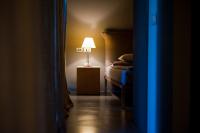 A bed or beds in a room at Vivere Suites & Rooms