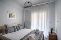 Posteľ alebo postele v izbe v ubytovaní Heliconia deluxe Apt Must