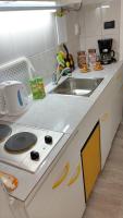 Kuchyňa alebo kuchynka v ubytovaní Studio Apartment Unity