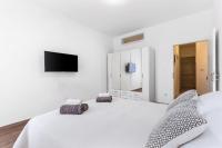 Posteľ alebo postele v izbe v ubytovaní Central Suite Rijeka