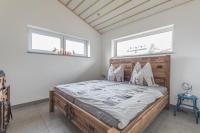 Postel nebo postele na pokoji v ubytování Ferienhaus Selke Am Bach