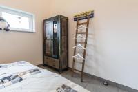 Postel nebo postele na pokoji v ubytování Ferienhaus Selke Am Bach